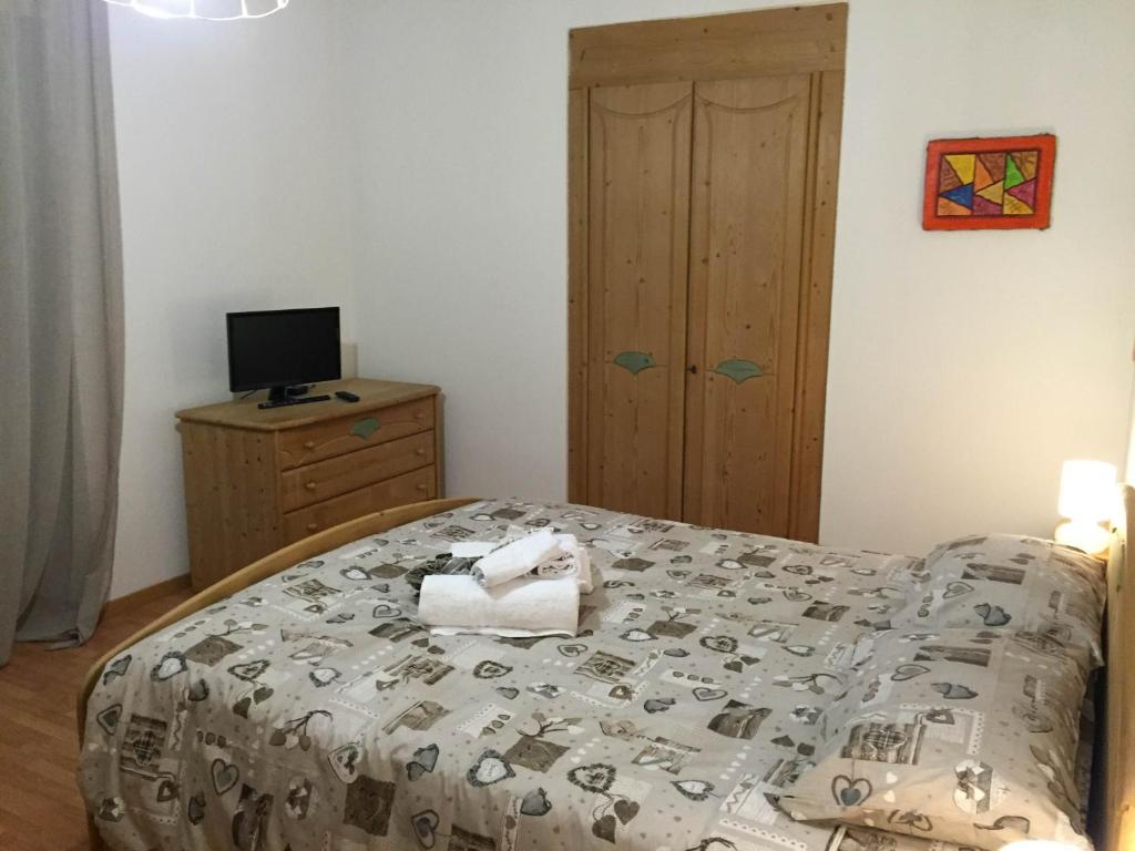 Łóżko lub łóżka w pokoju w obiekcie B&B Rosso Pila