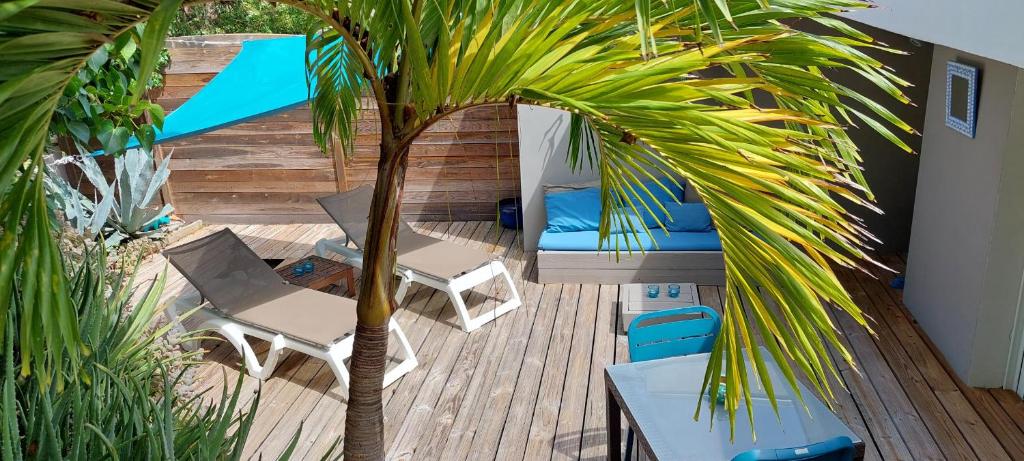 Patio nebo venkovní prostory v ubytování Jardin d'O résidence naturiste couples only