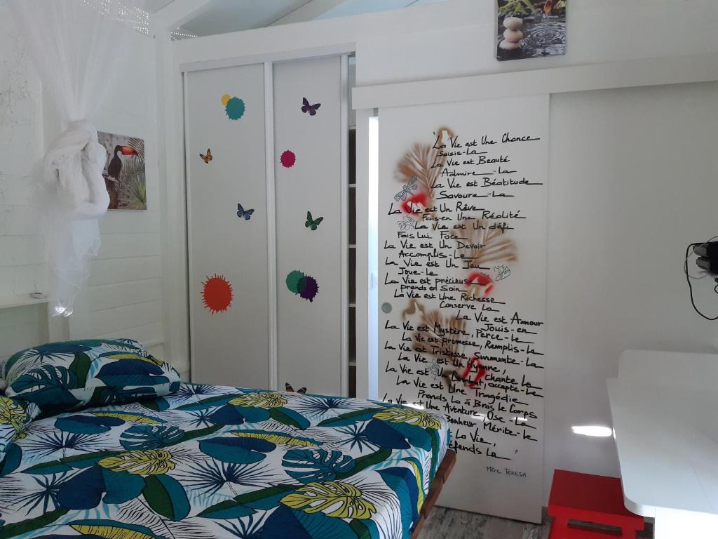 Postel nebo postele na pokoji v ubytování Pti coin tranquille