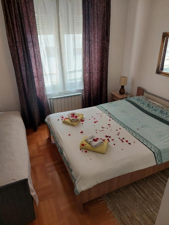 Ένα ή περισσότερα κρεβάτια σε δωμάτιο στο Apt Iva 2