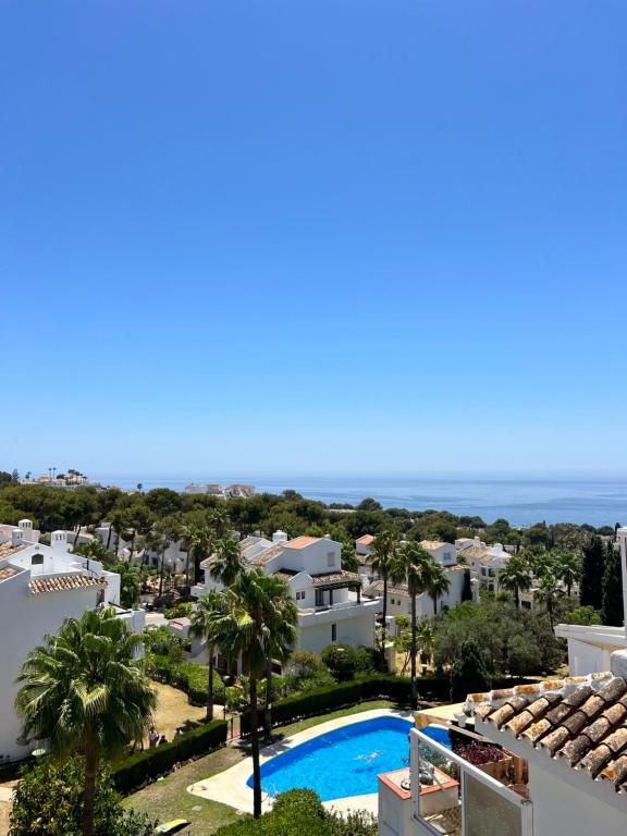 Two bedroom, two bathroom, balcony, pool area, view