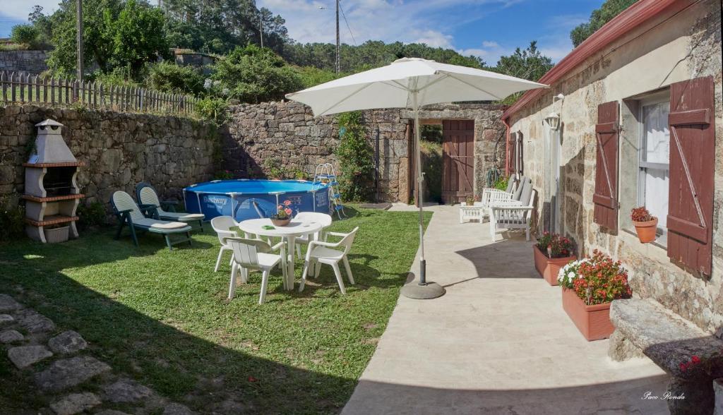 Patio nebo venkovní prostory v ubytování Casa de Mila en Creciente Pontevedra