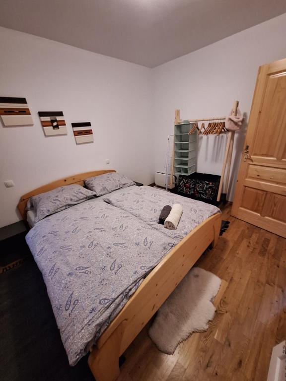 Postel nebo postele na pokoji v ubytování Sunrise Apartment