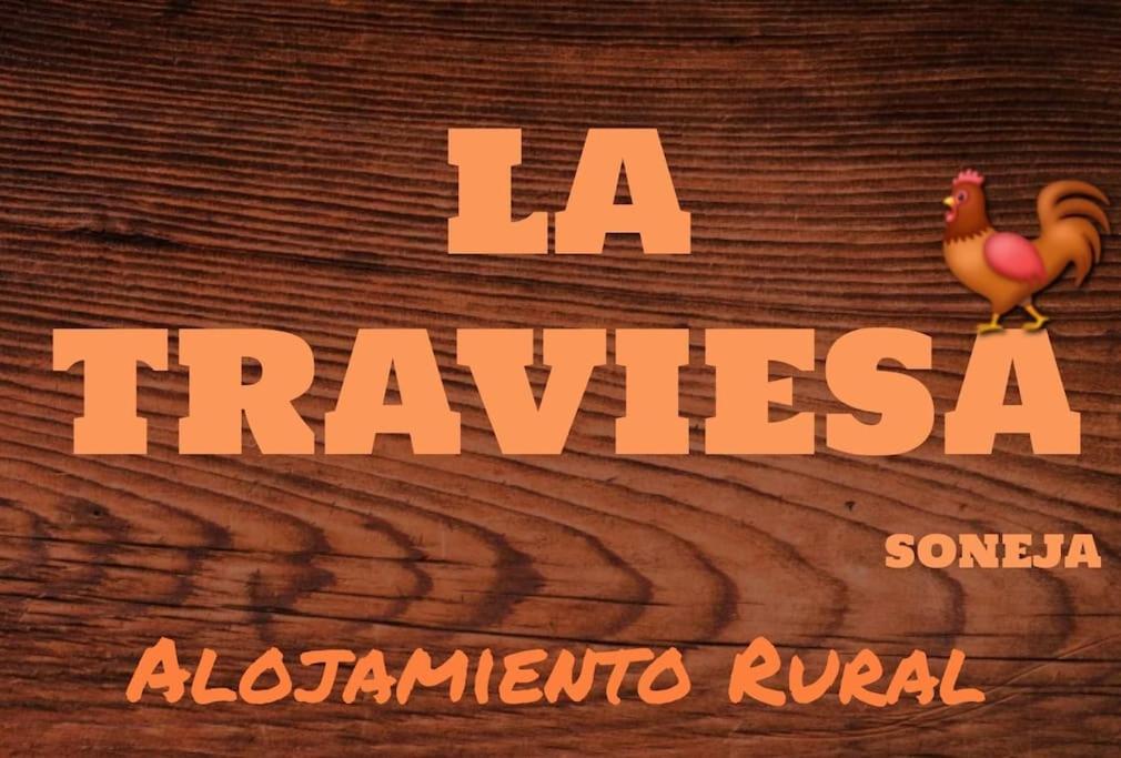 a poster for a movie with a chicken on a wooden floor at La Traviesa in Soneja