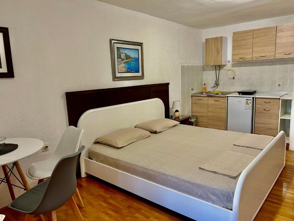 Kuchyň nebo kuchyňský kout v ubytování Apartments Jankovic