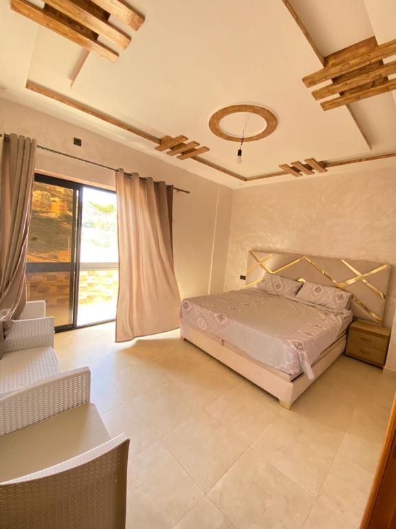 Postel nebo postele na pokoji v ubytování Appartement sfiha
