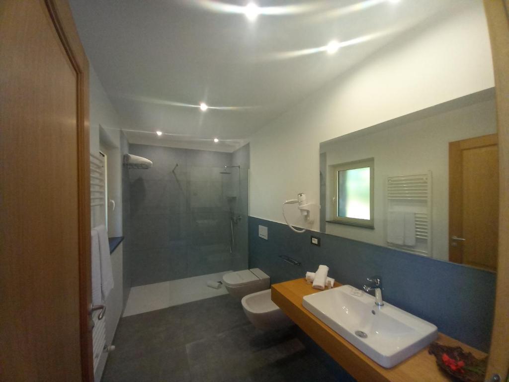 Koupelna v ubytování Agriturismo Lumia Resort