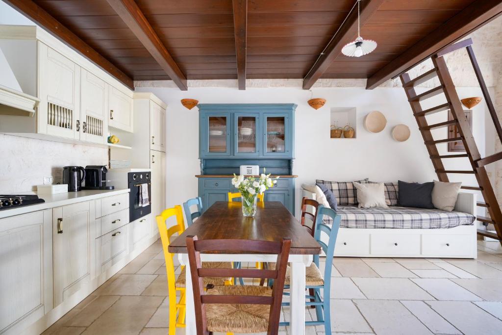 A kitchen or kitchenette at Dimora Monte Grappa