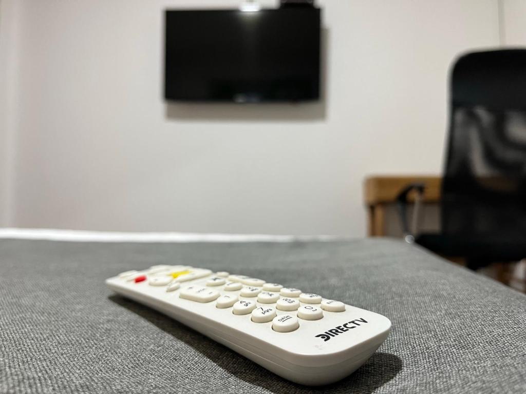 TV a/nebo společenská místnost v ubytování Titas House Bogota