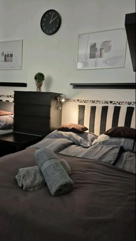 Posteľ alebo postele v izbe v ubytovaní Gecko Centrum Studio Apartman