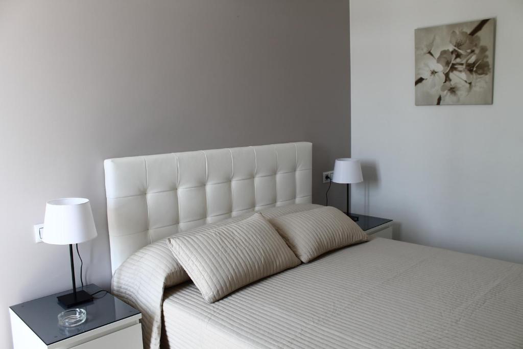 Postel nebo postele na pokoji v ubytování Hostal Landhaus