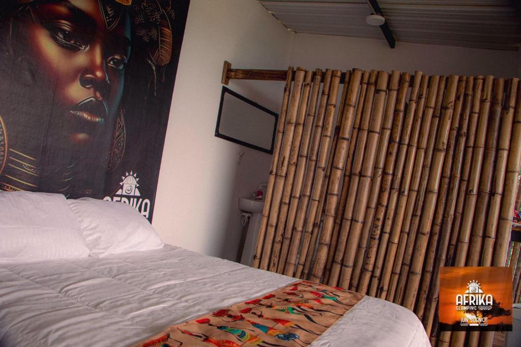 Postel nebo postele na pokoji v ubytování Afrika Glamping