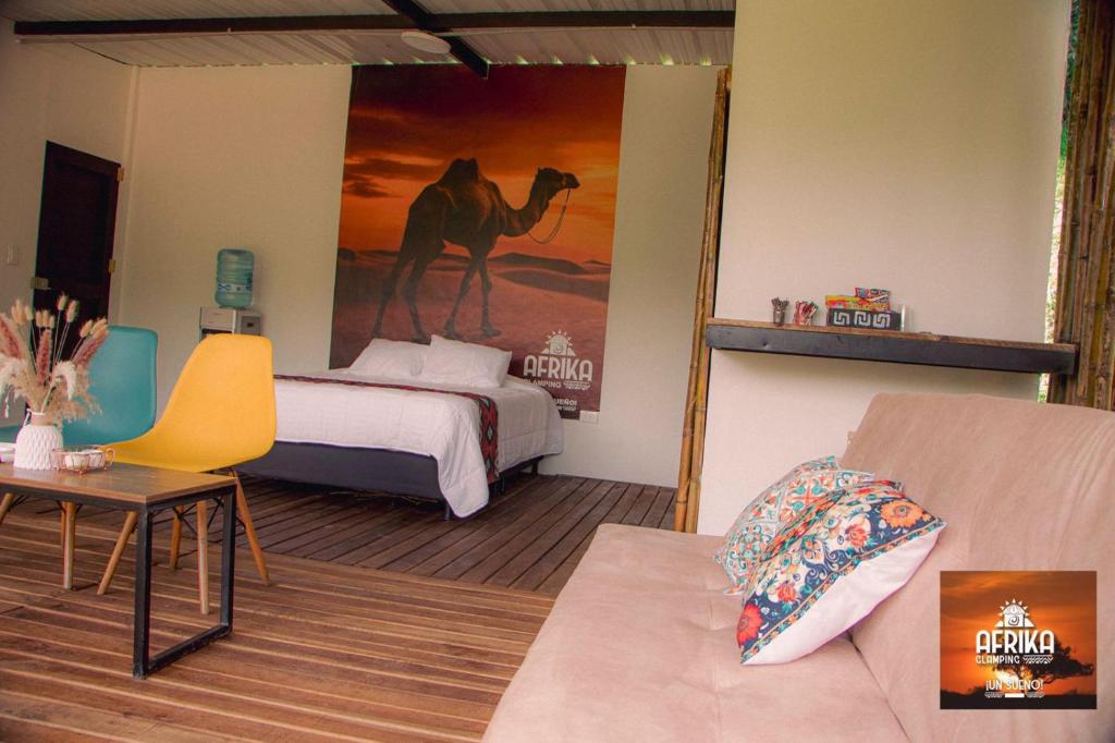 Postel nebo postele na pokoji v ubytování Afrika Glamping