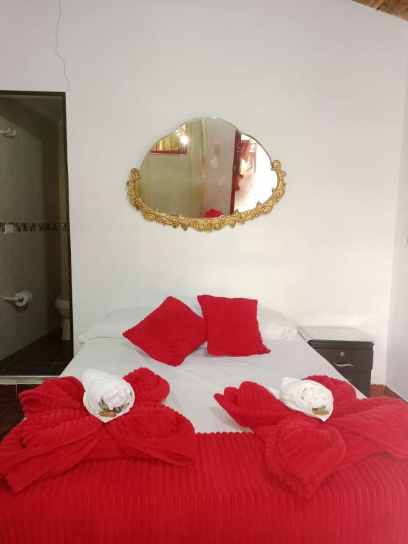 Postel nebo postele na pokoji v ubytování Libélula finca-hotel