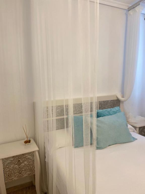Posteľ alebo postele v izbe v ubytovaní Casa Mina Cadiz