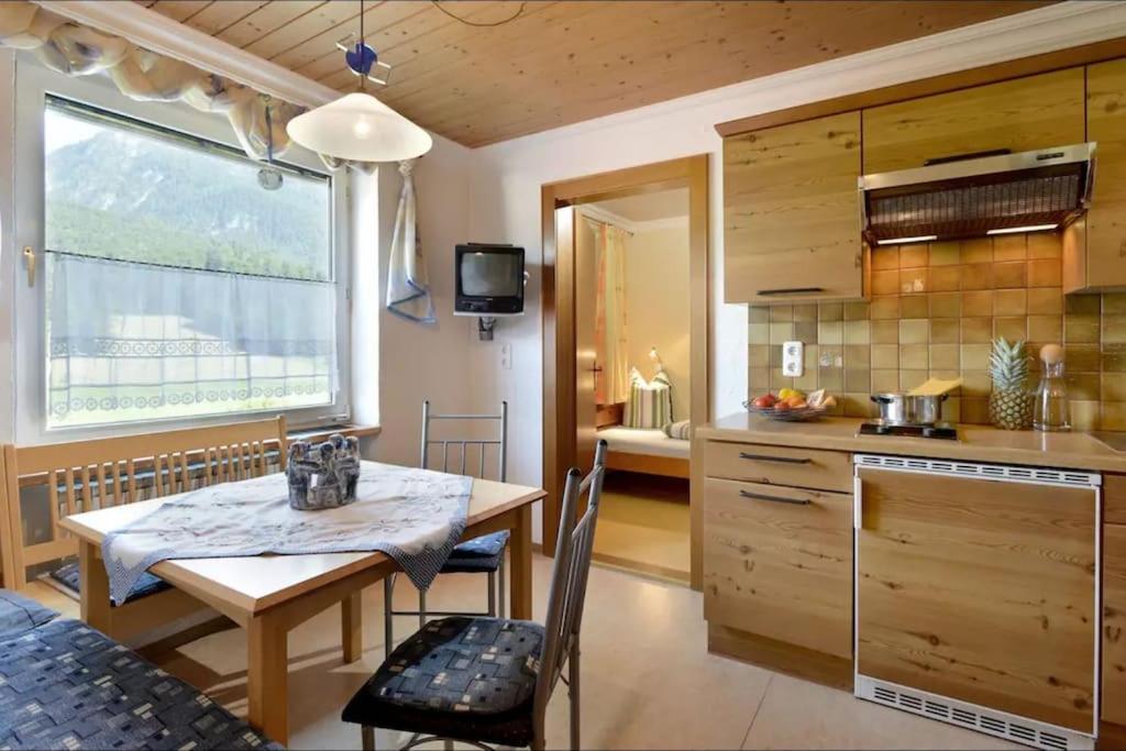 Kuchyň nebo kuchyňský kout v ubytování Appartement mit Kaiserblick