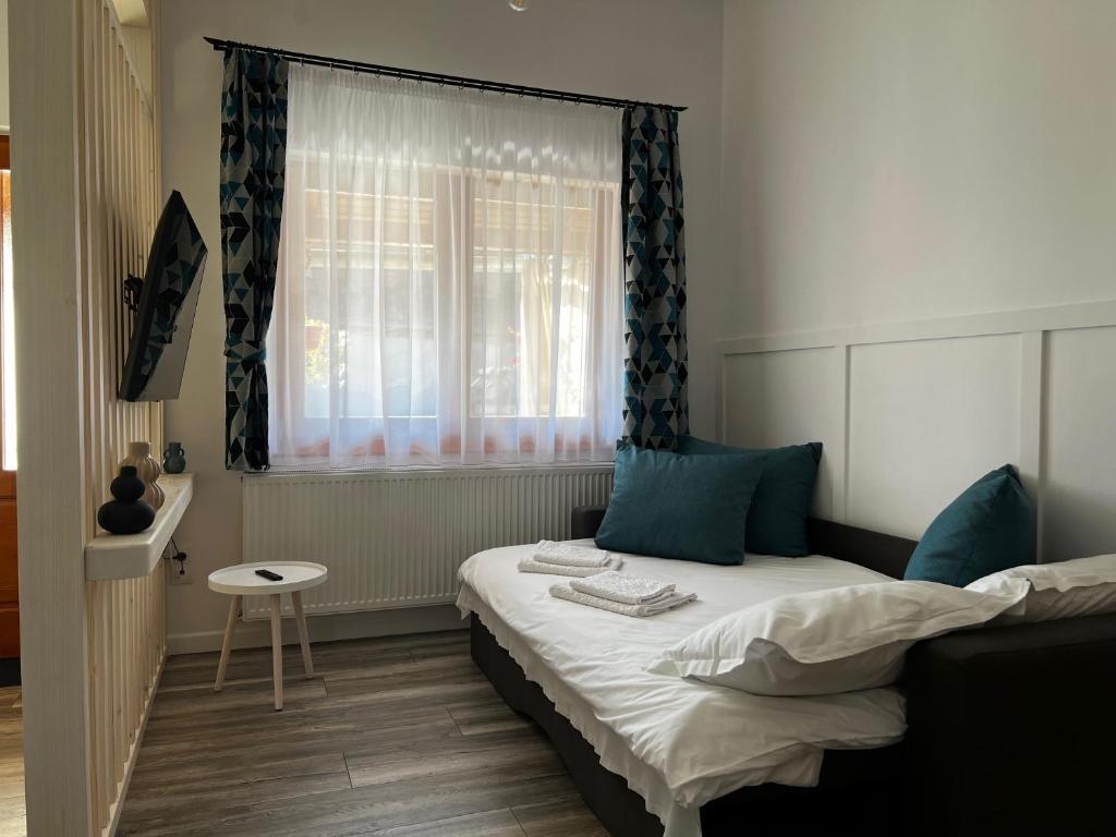 Postel nebo postele na pokoji v ubytování Casa Katona