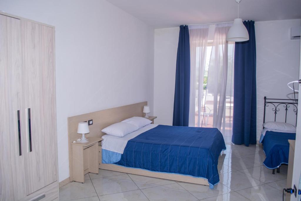 Postel nebo postele na pokoji v ubytování max hotel e restaurant