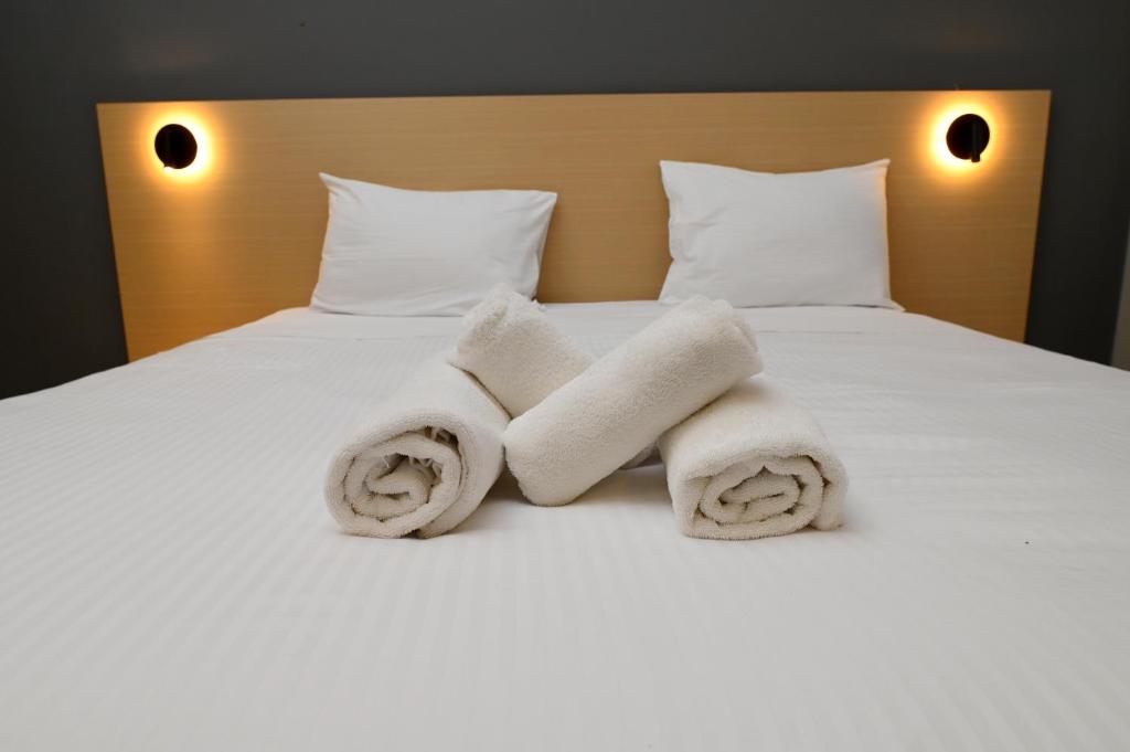 Postel nebo postele na pokoji v ubytování Onar hotel