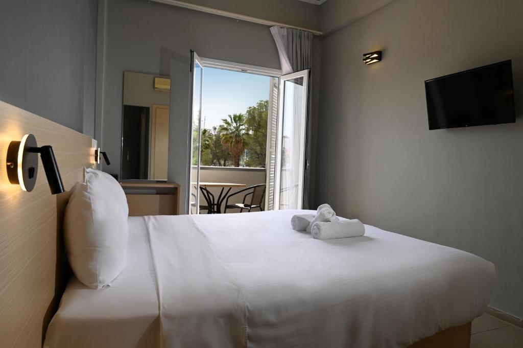 Postel nebo postele na pokoji v ubytování Onar hotel