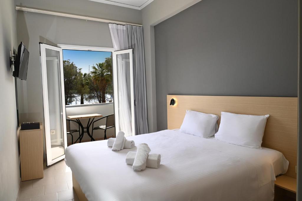 Postel nebo postele na pokoji v ubytování Onar hotel