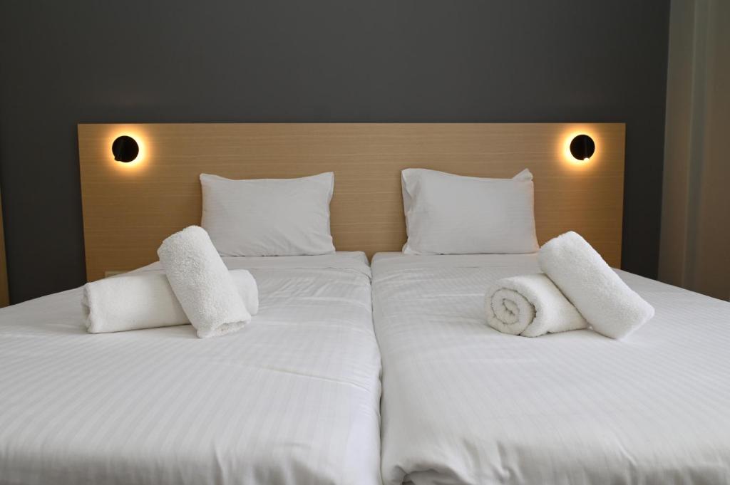 Postel nebo postele na pokoji v ubytování Onar hotel