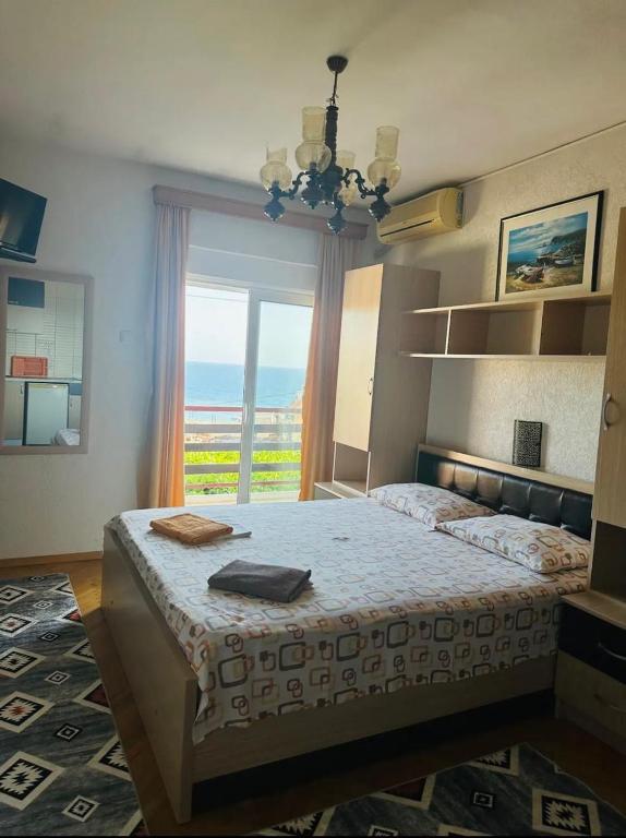 Postel nebo postele na pokoji v ubytování Hana & Uma Apartments