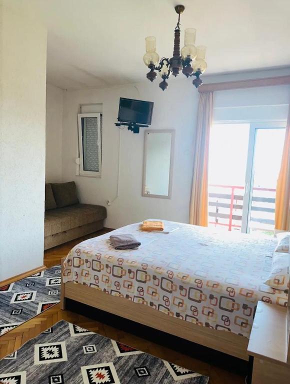 Postel nebo postele na pokoji v ubytování Hana & Uma Apartments