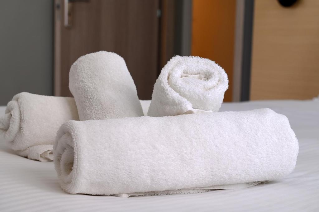 Postel nebo postele na pokoji v ubytování Onar hotel