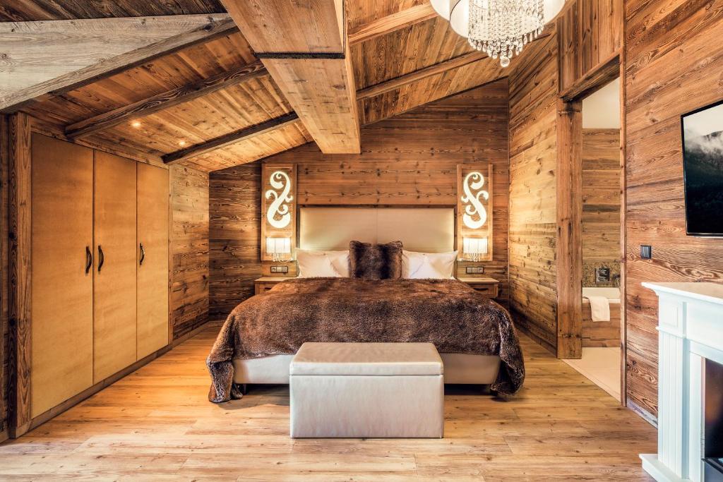 Postel nebo postele na pokoji v ubytování Wellnesshotel Oswald