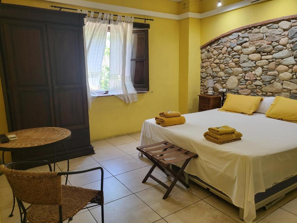 Postel nebo postele na pokoji v ubytování HOTEL PASTERAL RIU TER