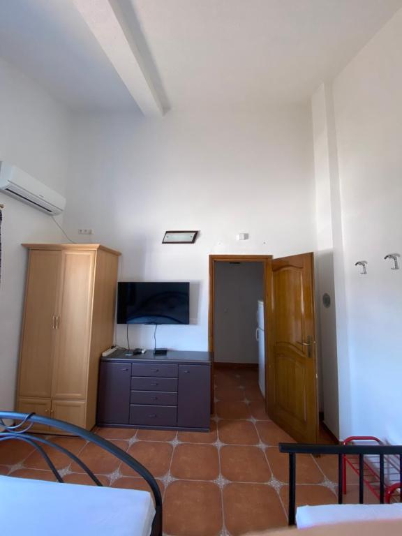 TV a/nebo společenská místnost v ubytování Guest House Nura