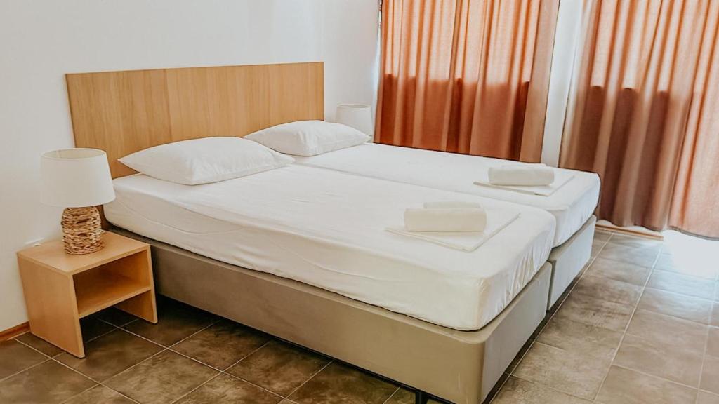 Postel nebo postele na pokoji v ubytování Motel Ljetni raj