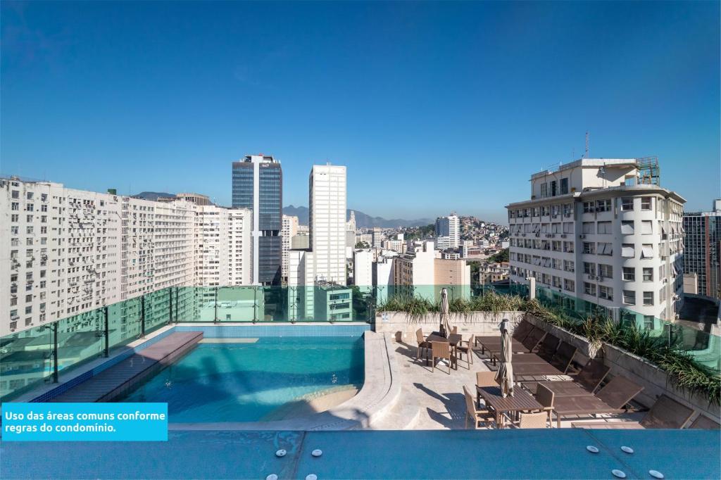 a swimming pool on the roof of a building at Lobie Casa Mauá in Rio de Janeiro