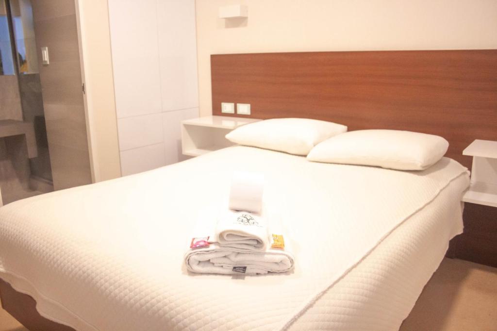 Postel nebo postele na pokoji v ubytování Hotel Don Bartolo