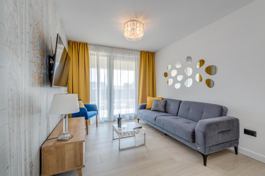 TV a/nebo společenská místnost v ubytování Panorama Coastal Haven