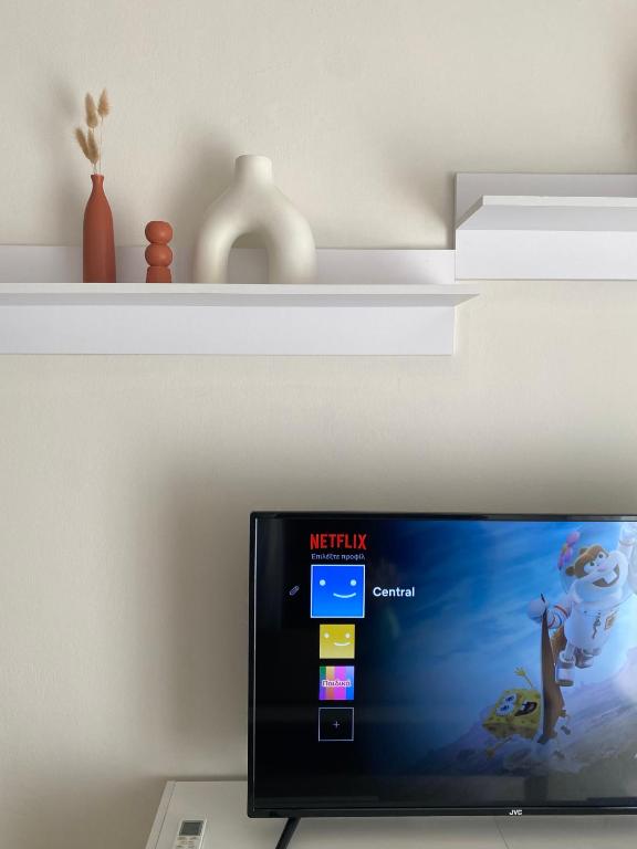 TV a/nebo společenská místnost v ubytování Central