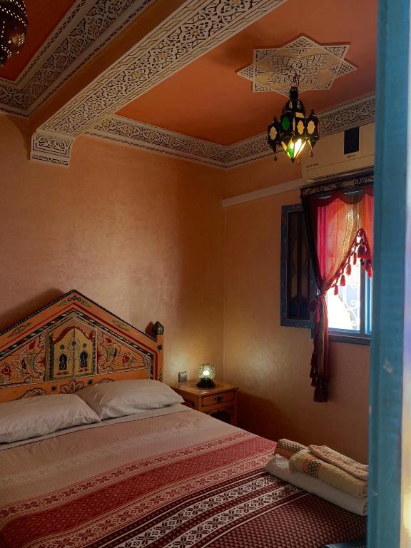 Postel nebo postele na pokoji v ubytování Dar Aldea
