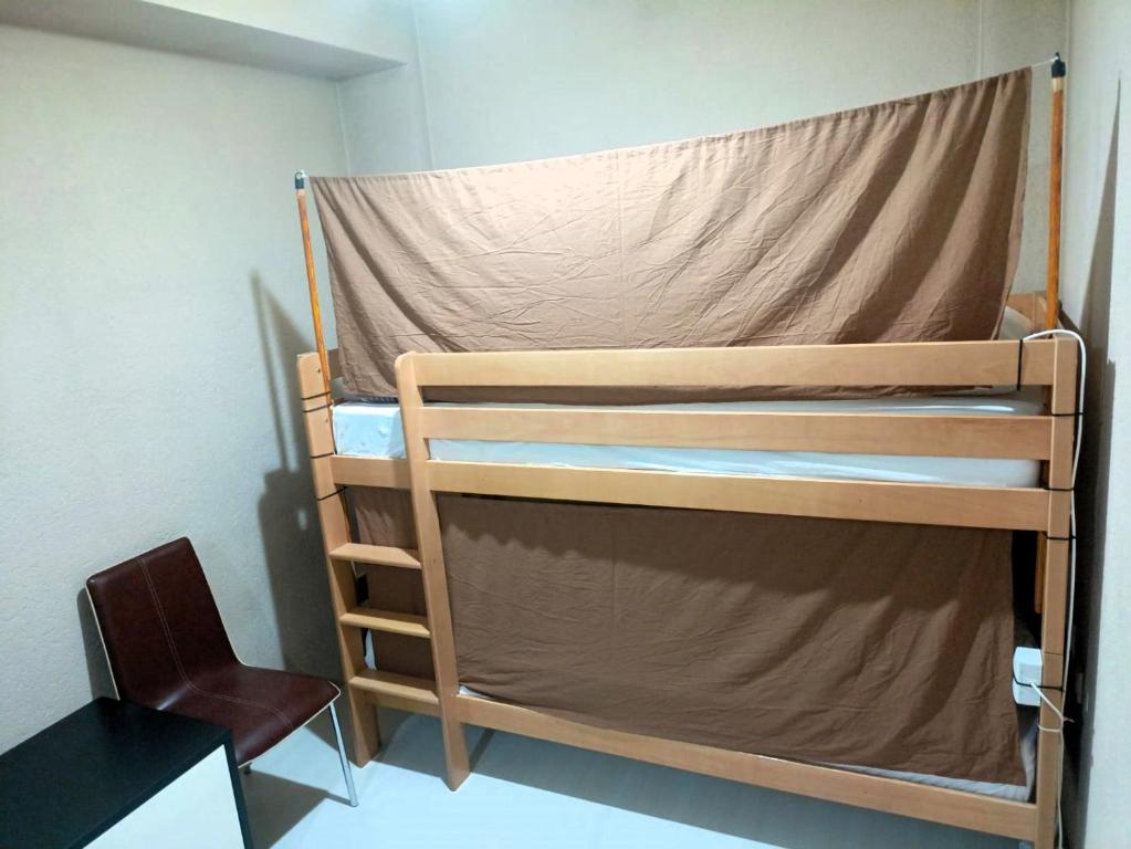 Кровать или кровати в номере Historia Hostel