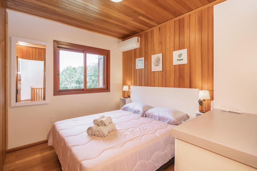 Postel nebo postele na pokoji v ubytování Casa de campo São Bartolomeu próximo a Garibaldi