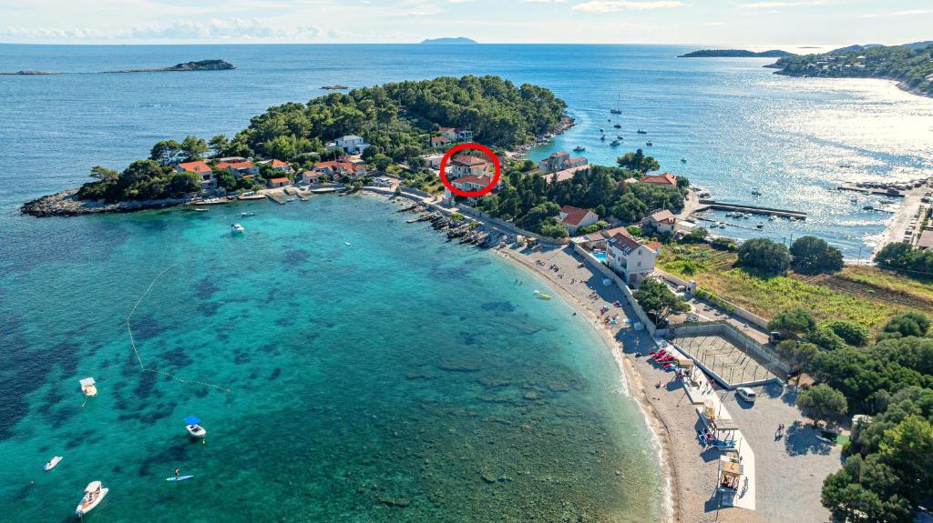 an aerial view of a small island in the ocean at Apartments by the sea Prizba, Korcula - 22068 in Blato