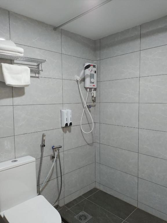 Koupelna v ubytování Remington Hotel