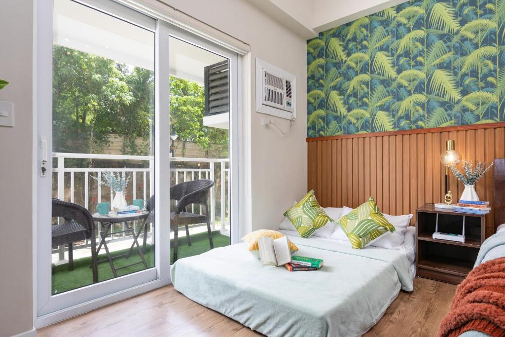Postel nebo postele na pokoji v ubytování AMANI 107B, 3 Minutes to Airport, with Gym & Pool ,FAST WIFI, Free Netflix