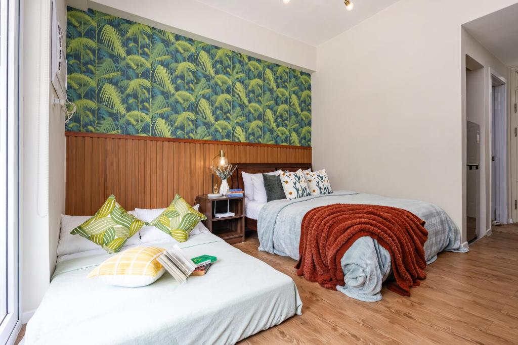 Postel nebo postele na pokoji v ubytování AMANI 107B, 3 Minutes to Airport, with Gym & Pool ,FAST WIFI, Free Netflix