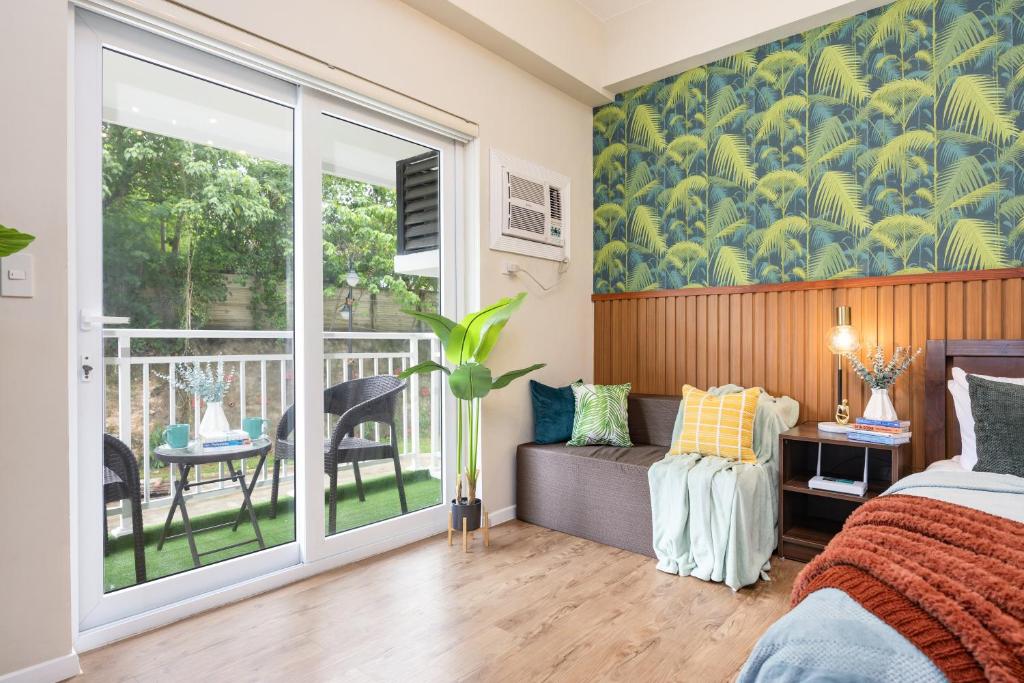 Postel nebo postele na pokoji v ubytování AMANI 107B, 3 Minutes to Airport, with Gym & Pool ,FAST WIFI, Free Netflix