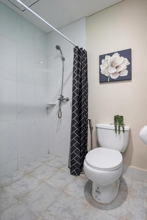 Koupelna v ubytování AMANI 107B, 3 Minutes to Airport, with Gym & Pool ,FAST WIFI, Free Netflix