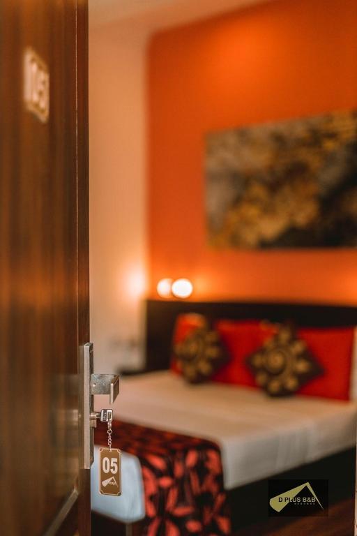Postel nebo postele na pokoji v ubytování D Plus B&B Negombo