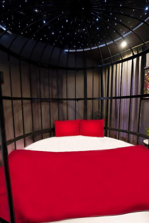 Postel nebo postele na pokoji v ubytování 69 Boutique by Minova
