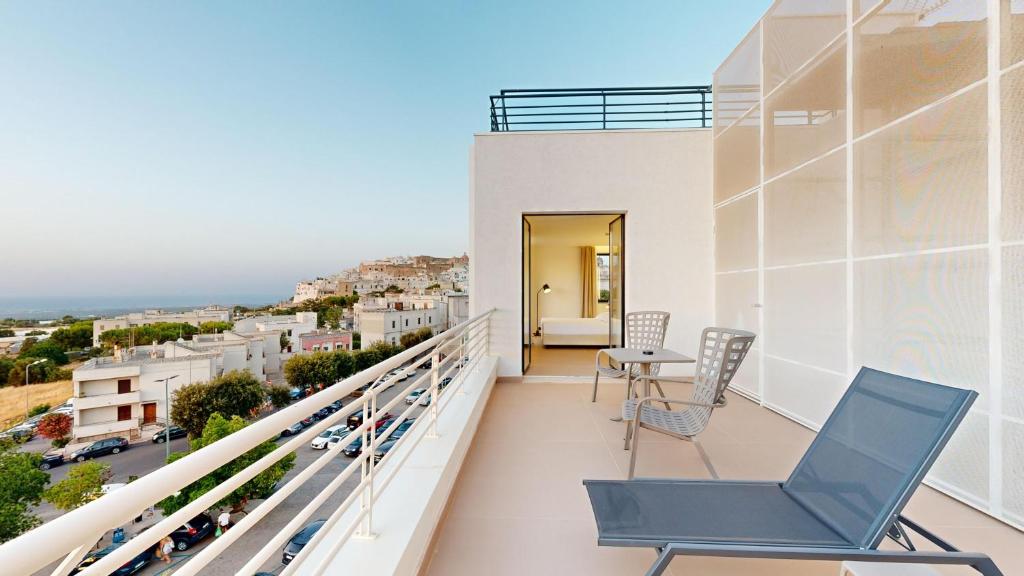 Balkón nebo terasa v ubytování PRIMO OSTUNI HOTEL
