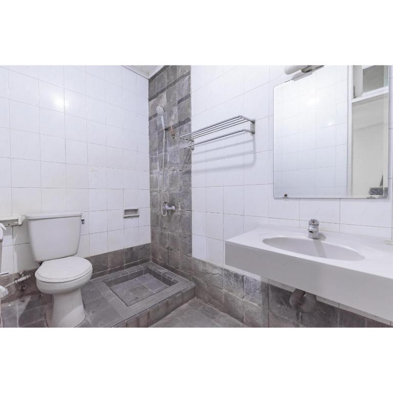 Koupelna v ubytování Urbanview Hotel Utari